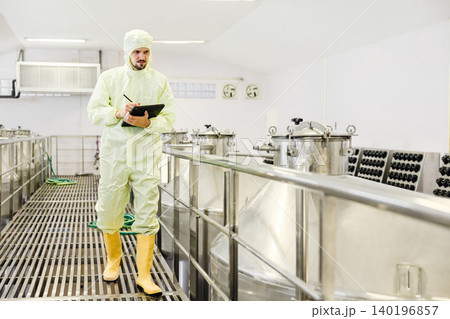 Winemaker professional working in modern large winery factory liquor alcohol drinks industry 140196857