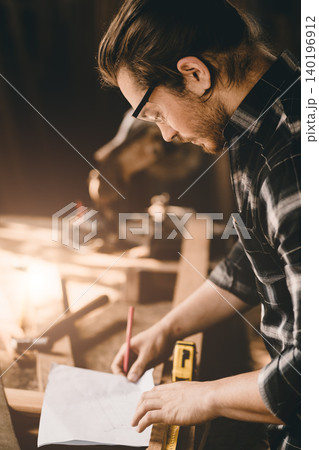 Professional carpenter sketch design furniture in wood workshop authentic handcraft working people. Professional carpenter sketch design furniture in wood workshop authentic handcraft working people. 140196912