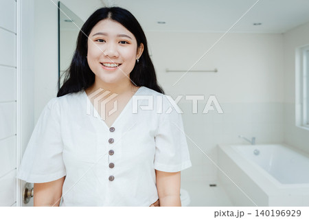 Happy women teen at bathroom for satisfied after bathroom cleaning at home concept 140196929