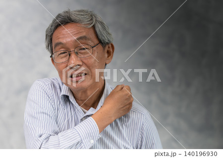 Senior business man suffering shoulder pain, office syndrome hand massaging with space for text Senior business man suffering shoulder pain, office syndrome hand massaging with space for text 140196930