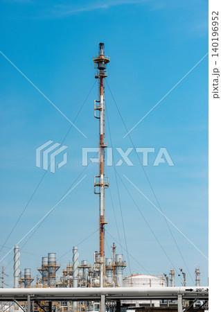 Methane Gas Fire High Flare Stack Flaring Tower Platform in Refinery Petroleum Plant or Flame Burn Methane Gas Fire High Flare Stack Flaring Tower Platform in Refinery Petroleum Plant or Flame Burn 140196952