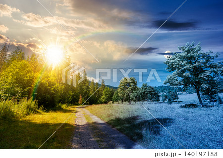 day meet night. view of a country road in mountains for travel. road journey through countryside summer scenery. sun and moon over forest on the background hill. epic sky. astrology and harmony day meet night. view of a country road in mountains for travel. road journey through countryside summer scenery. sun and moon over forest on the background hill. epic sky. astrology and harmony 140197188