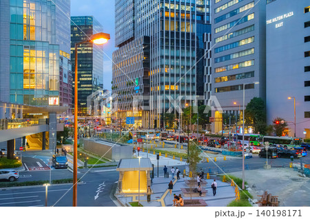 Osaka, Japan - Sep 25 2024, panoramic view of the square and the intersection with busy traffic surrounded by skyscrapers. shopping malls and branded stores, at evening with street light, Osaka, Japan Osaka, Japan - Sep 25 2024, panoramic view of the square and the intersection with busy traffic surrounded by skyscrapers. shopping malls and branded stores, at evening with street light, Osaka, Japan 140198171