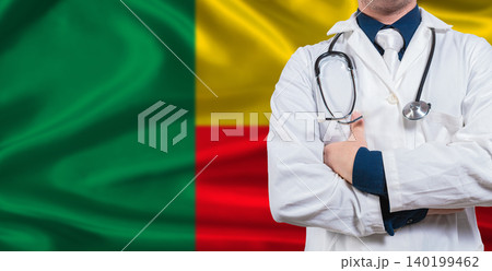 Male doctor with stethoscope on Beninese flag. Doctor holding stethoscope on Benin flag Male doctor with stethoscope on Beninese flag. Doctor holding stethoscope on Benin flag 140199462