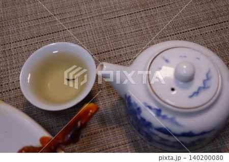 Tea Ceremony Setup with Blue and White Teapot Tea Ceremony Setup with Blue and White Teapot 140200080