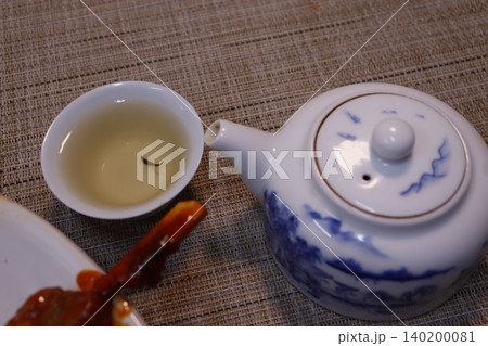 Tea Ceremony with Blue and White Teapot and Food Tea Ceremony with Blue and White Teapot and Food 140200081