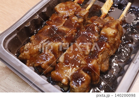 Glistening Skewered Meat in Tray Glistening Skewered Meat in Tray 140200098