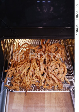 Fried Chicken Strips in Air Fryer Basket Fried Chicken Strips in Air Fryer Basket 140200099