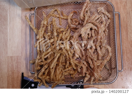Fried Food in Metal Strainer Fried Food in Metal Strainer 140200127