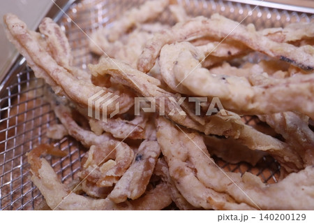 Fried Tempura on Metal Rack Close-up 140200129
