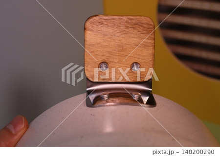 Wooden and Metal Clamp Attachment Close-up 140200290