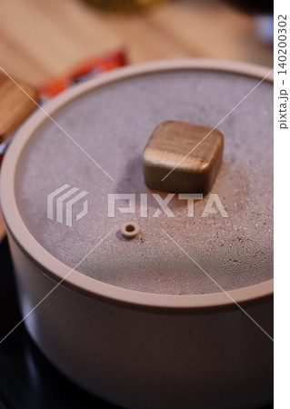 Close-up of a Pot Lid with Knob and Vent Hole 140200302
