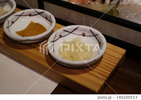 Sushi Accompaniments in Traditional Bowls Sushi Accompaniments in Traditional Bowls 140200553
