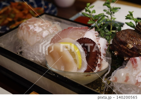 Fresh Seafood Sashimi Platter with Garnishes Fresh Seafood Sashimi Platter with Garnishes 140200565