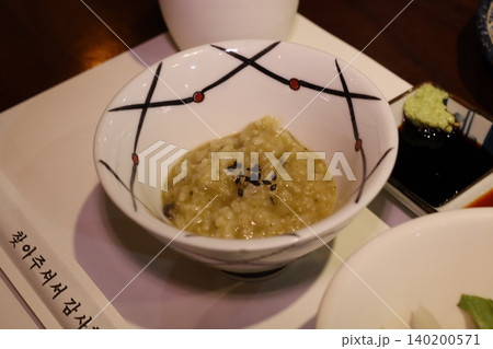 Rice Dish with Sesame Seeds in Decorative Bowl 140200571