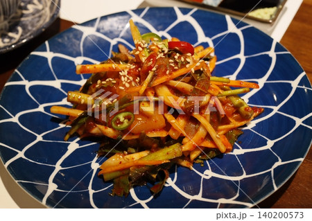 Spicy Vegetable Stir-Fry on Blue Plate Spicy Vegetable Stir-Fry on Blue Plate 140200573
