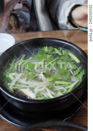 Steaming Bowl of Fresh Vegetable Soup Steaming Bowl of Fresh Vegetable Soup 140200582