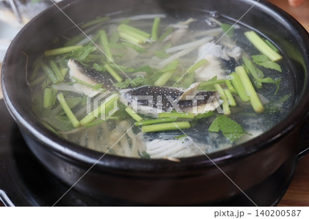 Steaming Fish Soup with Vegetables in Pot Steaming Fish Soup with Vegetables in Pot 140200587