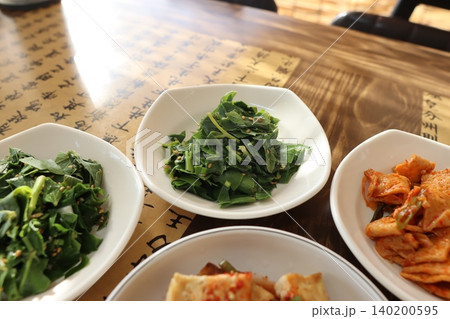 Korean Banchan Side Dishes on Calligraphy Table Korean Banchan Side Dishes on Calligraphy Table 140200595