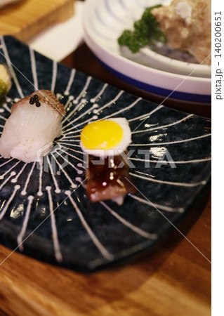 Sushi Plate with Quail Egg and Garnishes Sushi Plate with Quail Egg and Garnishes 140200651