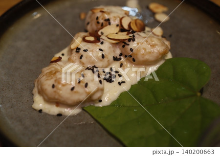 Gourmet Dish with Almonds and Sesame Seeds 140200663