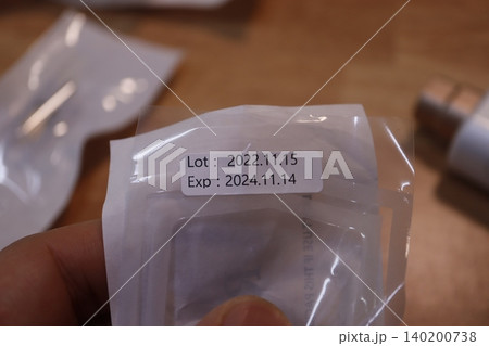 Close-up of Product Packaging with Lot and Expiry Dates Close-up of Product Packaging with Lot and Expiry Dates 140200738