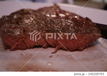 Juicy Medium-Rare Steak Close-Up Juicy Medium-Rare Steak Close-Up 140200765