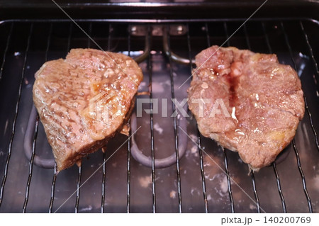 Grilled Meat on a Grill Rack 140200769