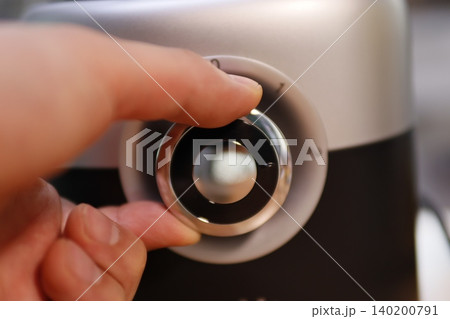 Hand Adjusting Device Knob Close-Up Hand Adjusting Device Knob Close-Up 140200791