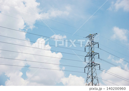 a big electric post with cloudy sky a big electric post with cloudy sky 140200960