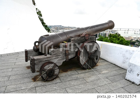 Ancient cannon on wooden wheels display at historic heritage Guia Fortress built in 1622 on Guia Hill in Macau China 140202574