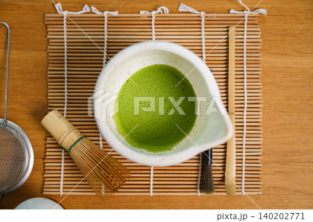 Japanese matcha tea ceremony equipment on wooden table Japanese matcha tea ceremony equipment on wooden table 140202771