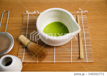 Japanese matcha tea ceremony equipment on wooden table Japanese matcha tea ceremony equipment on wooden table 140202772