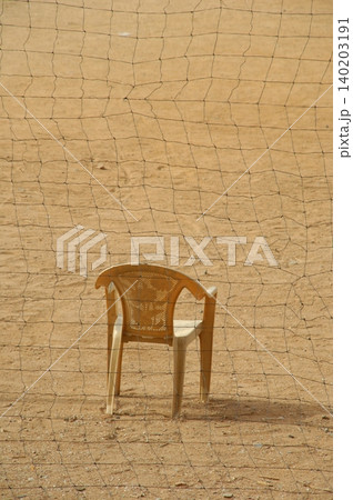Plastic Chair on road Plastic Chair on road 140203191