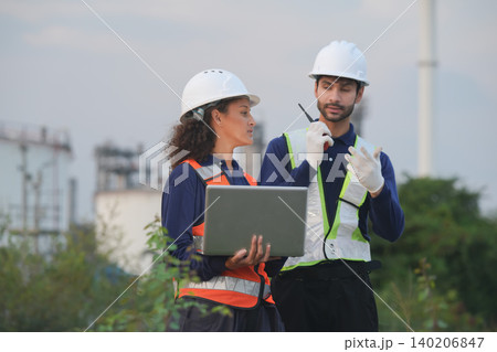 Collaborative safety meeting industrial site business discussion outdoor professional perspective teamwork in engineering Collaborative safety meeting industrial site business discussion outdoor professional perspective teamwork in engineering 140206847