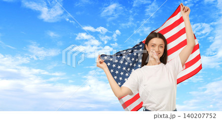 USA 250, Woman holds American flag high. Celebration of freedom and national pride concept USA 250, Woman holds American flag high. Celebration of freedom and national pride concept 140207752