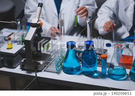 Researchers working in the clinical laboratory 140209651