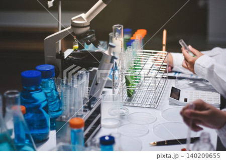 Researchers working in the clinical laboratory Researchers working in the clinical laboratory 140209655