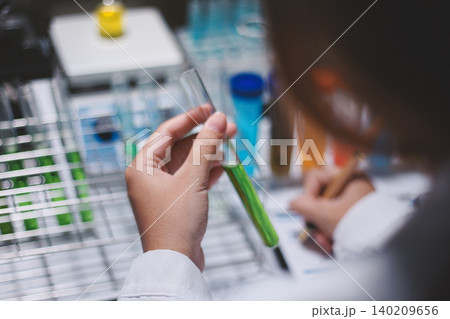Researchers working in the clinical laboratory Researchers working in the clinical laboratory 140209656