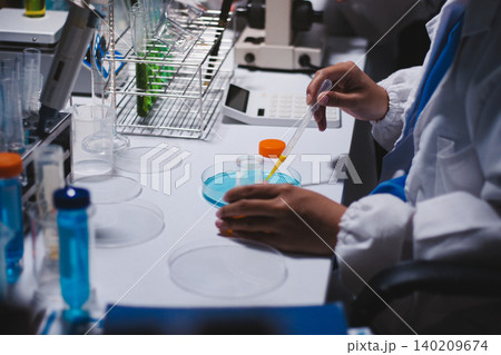 Researchers working in the clinical laboratory 140209674