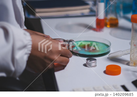 Researchers working in the clinical laboratory Researchers working in the clinical laboratory 140209685