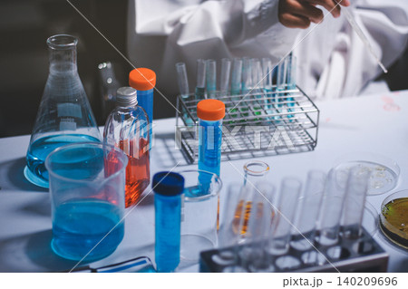 Researchers working in the clinical laboratory Researchers working in the clinical laboratory 140209696