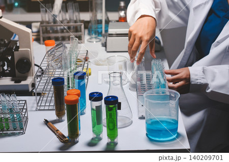 Researchers working in the clinical laboratory Researchers working in the clinical laboratory 140209701