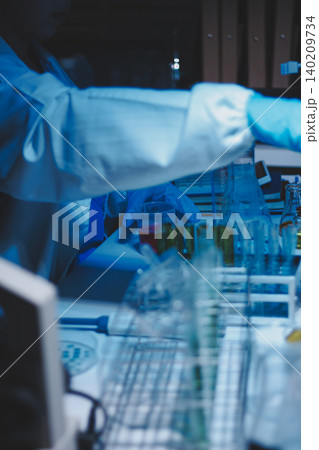 Researchers working in the clinical laboratory Researchers working in the clinical laboratory 140209734