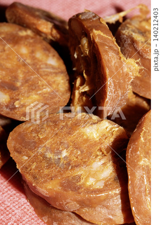 Close up of chorizo sliced cooking frying food preparation for meal Close up of chorizo sliced cooking frying food preparation for meal 140212403