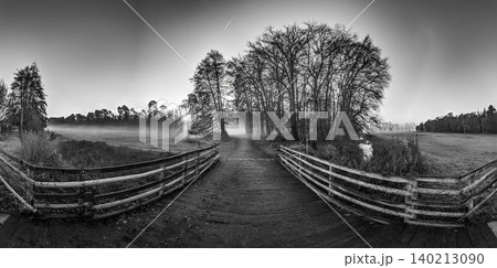 Wooden Bridge Across Wetlands in Morning Fog Wooden Bridge Across Wetlands in Morning Fog 140213090