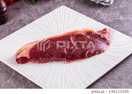 Raw beef striploin steak with marbling Raw beef striploin steak with marbling 140213280