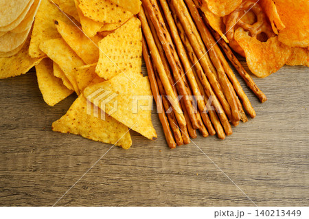 Mix of variety snack chips pretzel and cracker, junk crunchy food. Mix of variety snack chips pretzel and cracker, junk crunchy food. 140213449