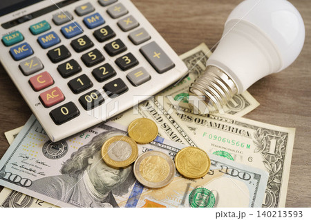 Cost of electric utilities with light bulb for payment. 140213593