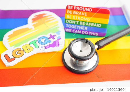 Stethoscope on LGBT rainbow flag, rights and gender equality. Stethoscope on LGBT rainbow flag, rights and gender equality. 140213604